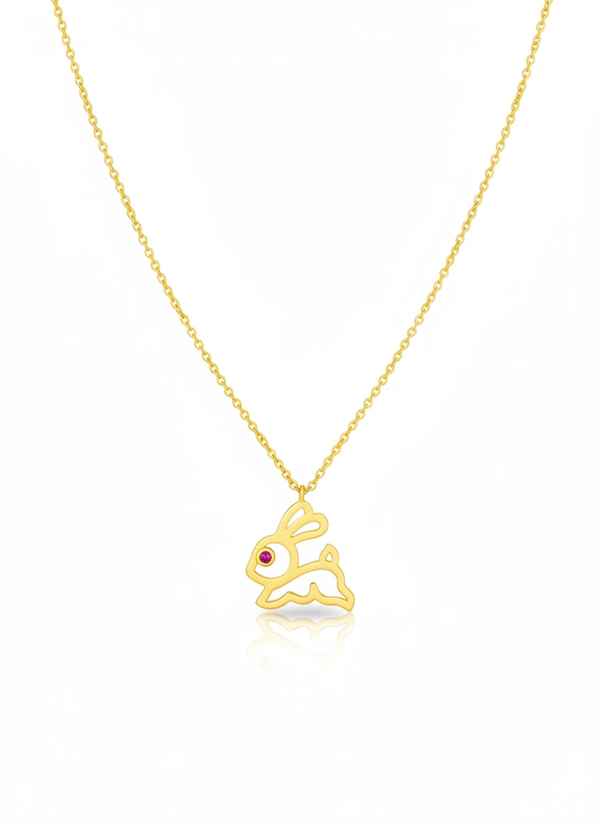 18k Gold plated necklace with a bunny pendant on a white background