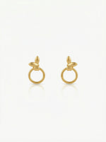 Pair of 18k gold plated earrings on a white background