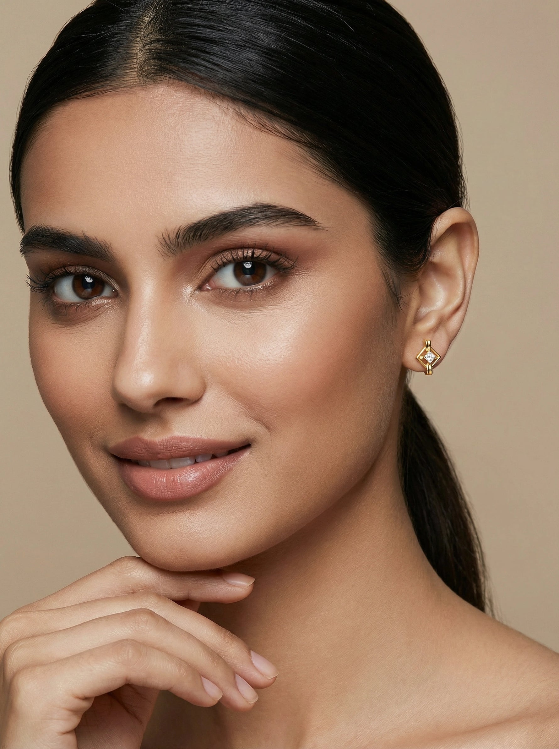 Close-up of a woman with a neutral background