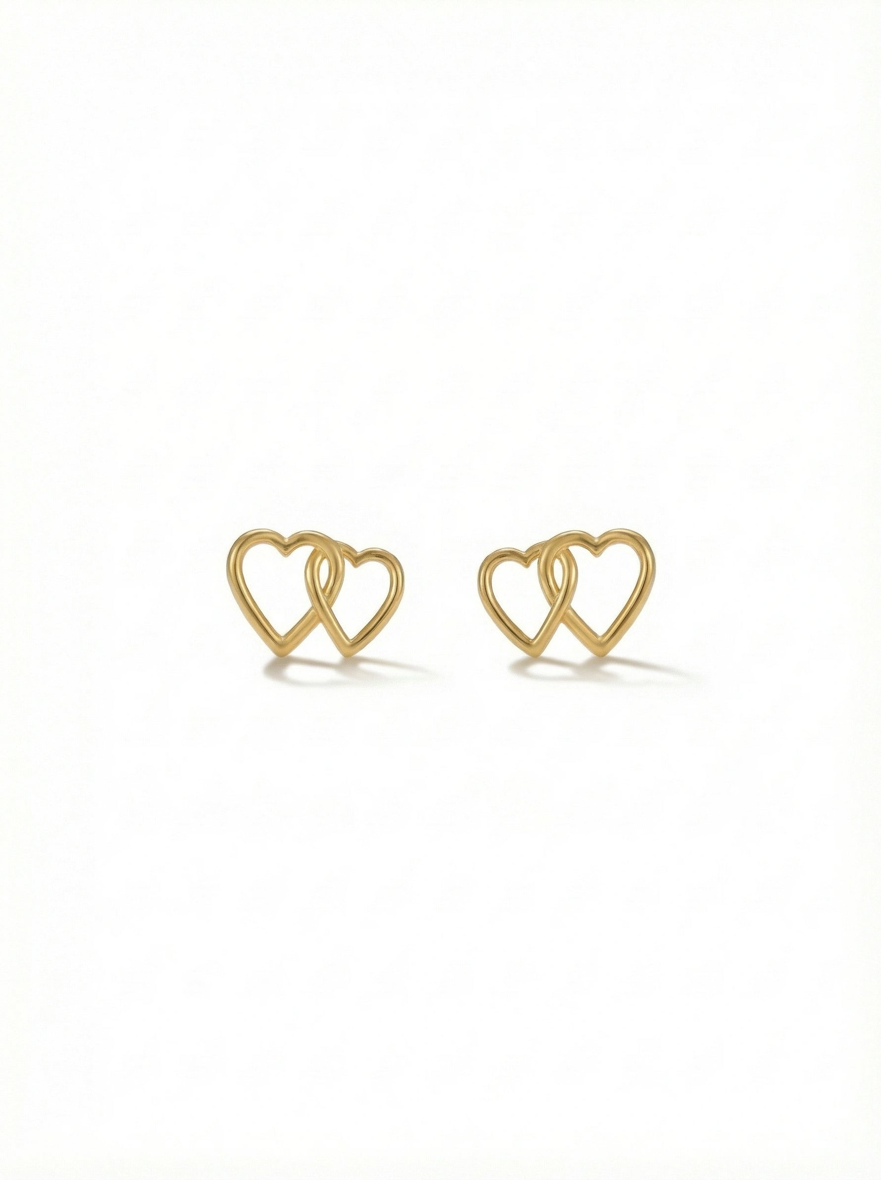 18k Gold plated heart-shaped earrings on a white background