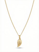 18k Gold plated leaf pendant necklace on a white background
