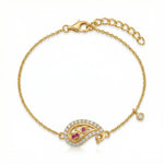 18k Gold plated bracelet with a decorative clasp on a white background