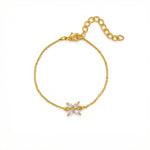 18k Gold plated bracelet with a star-shaped clasp on a white background