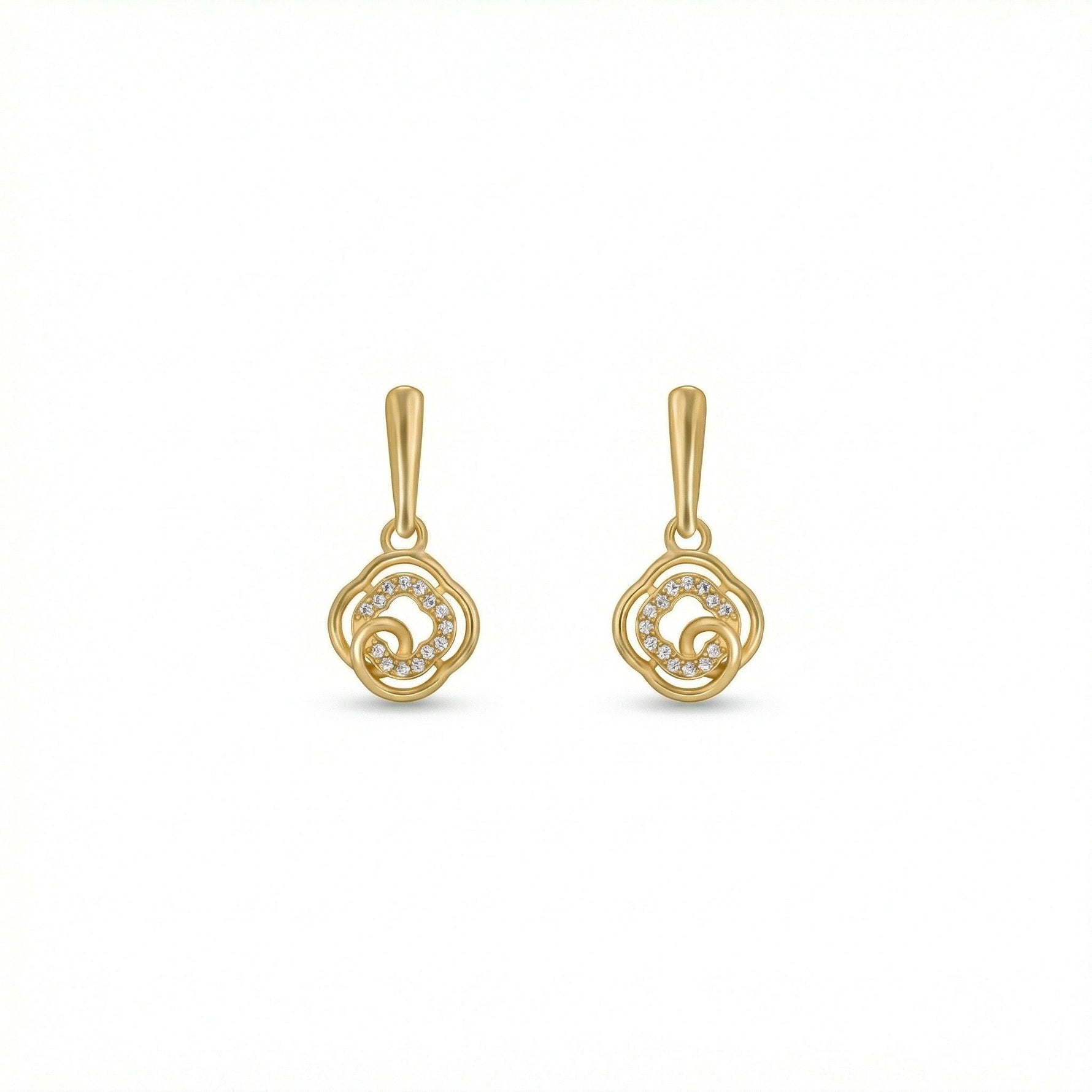 Pair of 18k gold plated earrings on a white background