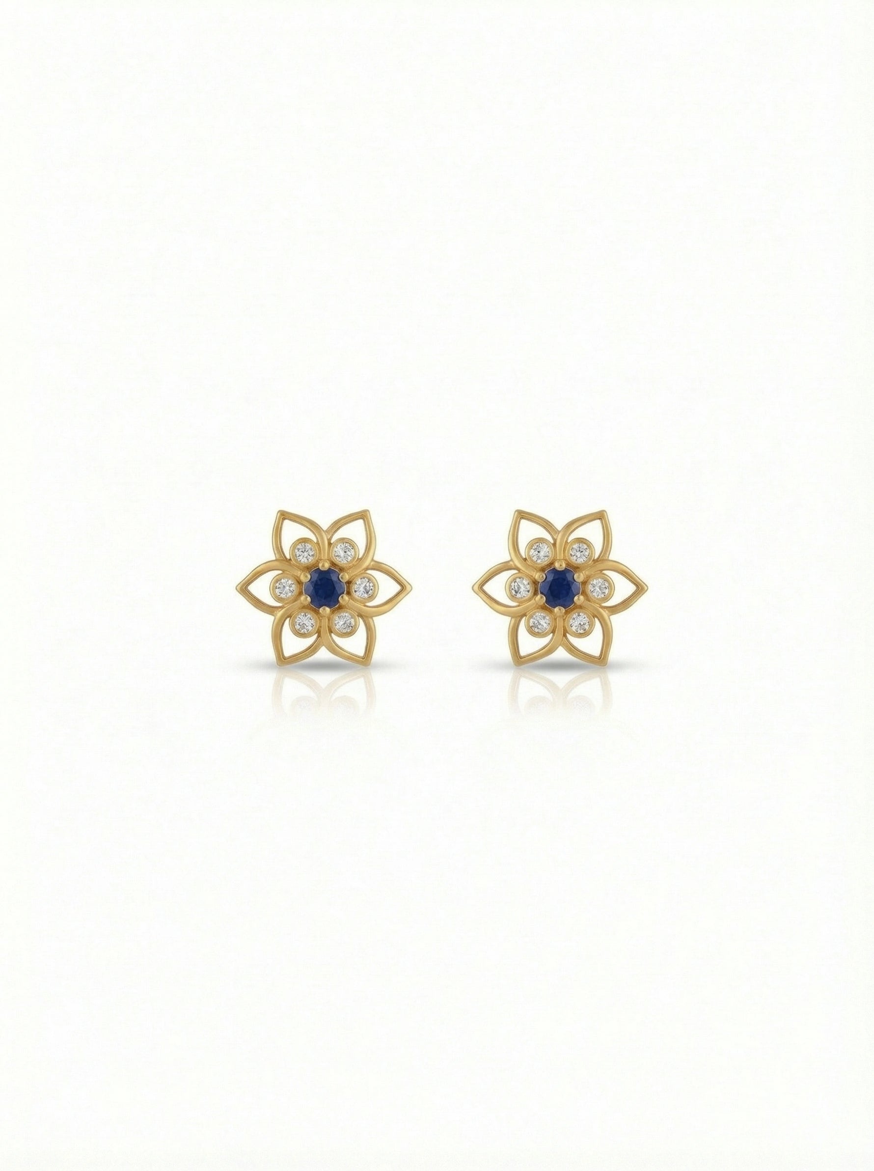 18k Gold plated  flower-shaped earrings with blue centers on a white background
