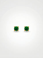 Pair of green gemstone earrings with 18k gold plated settings on a white background