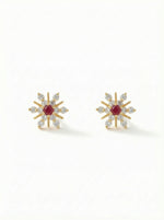 Pair of silver heart-shaped 18k gold plated earrings on a white background