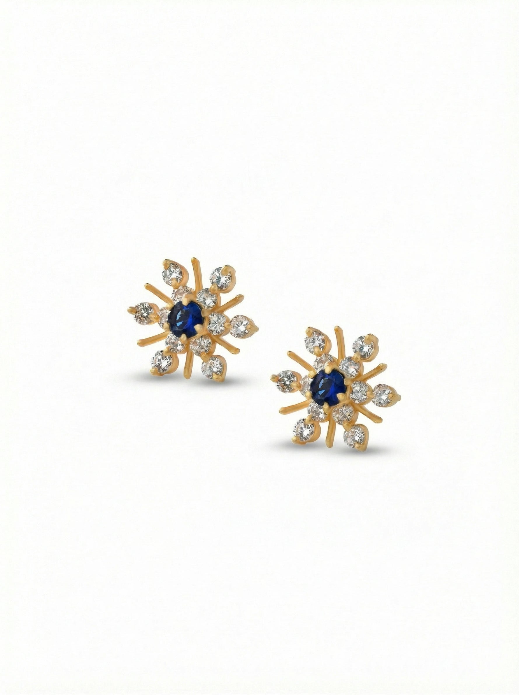 18k Gold plated earrings with blue gemstones on a white background