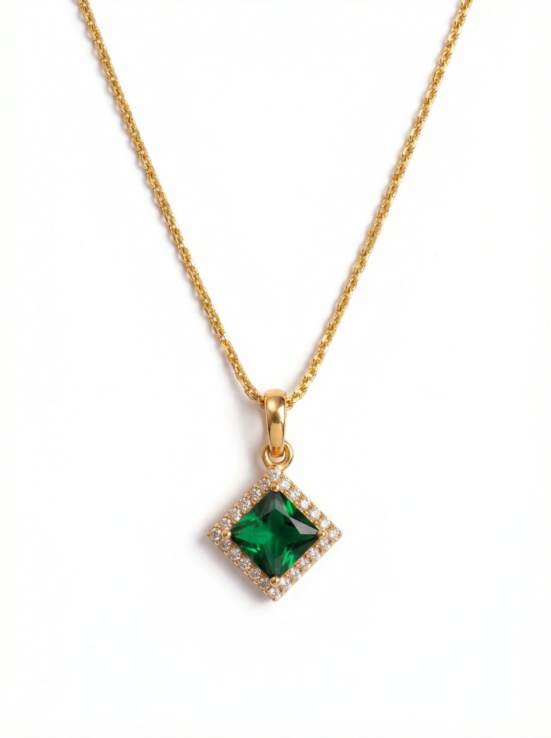 18k Gold plated necklace with a green gemstone pendant on a white background