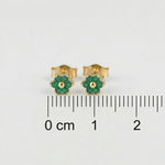 18k Gold plated earrings with green gemstones on a white background with measurement scale.