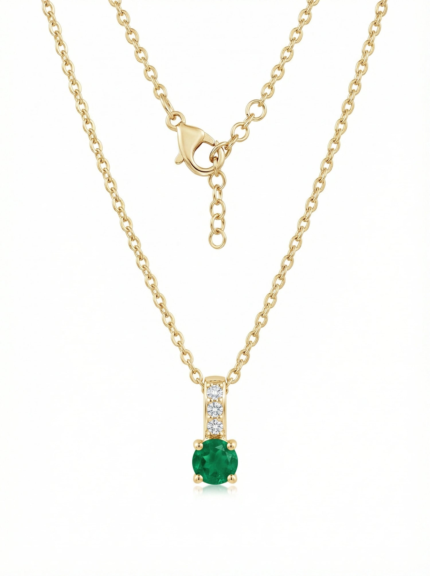 18k Gold plated  necklace with a green gemstone pendant on a white background