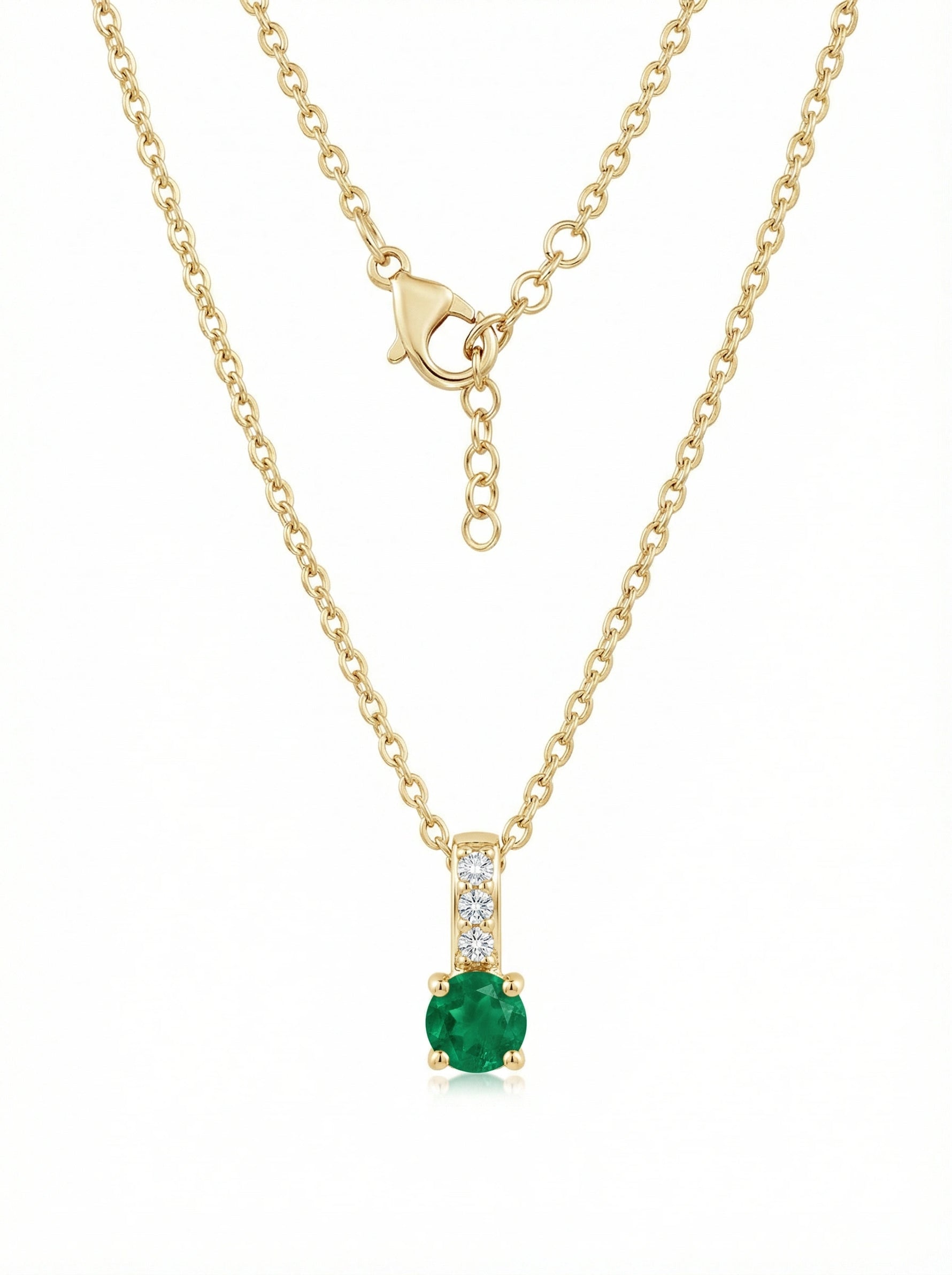 18k Gold plated  necklace with a green gemstone pendant on a white background
