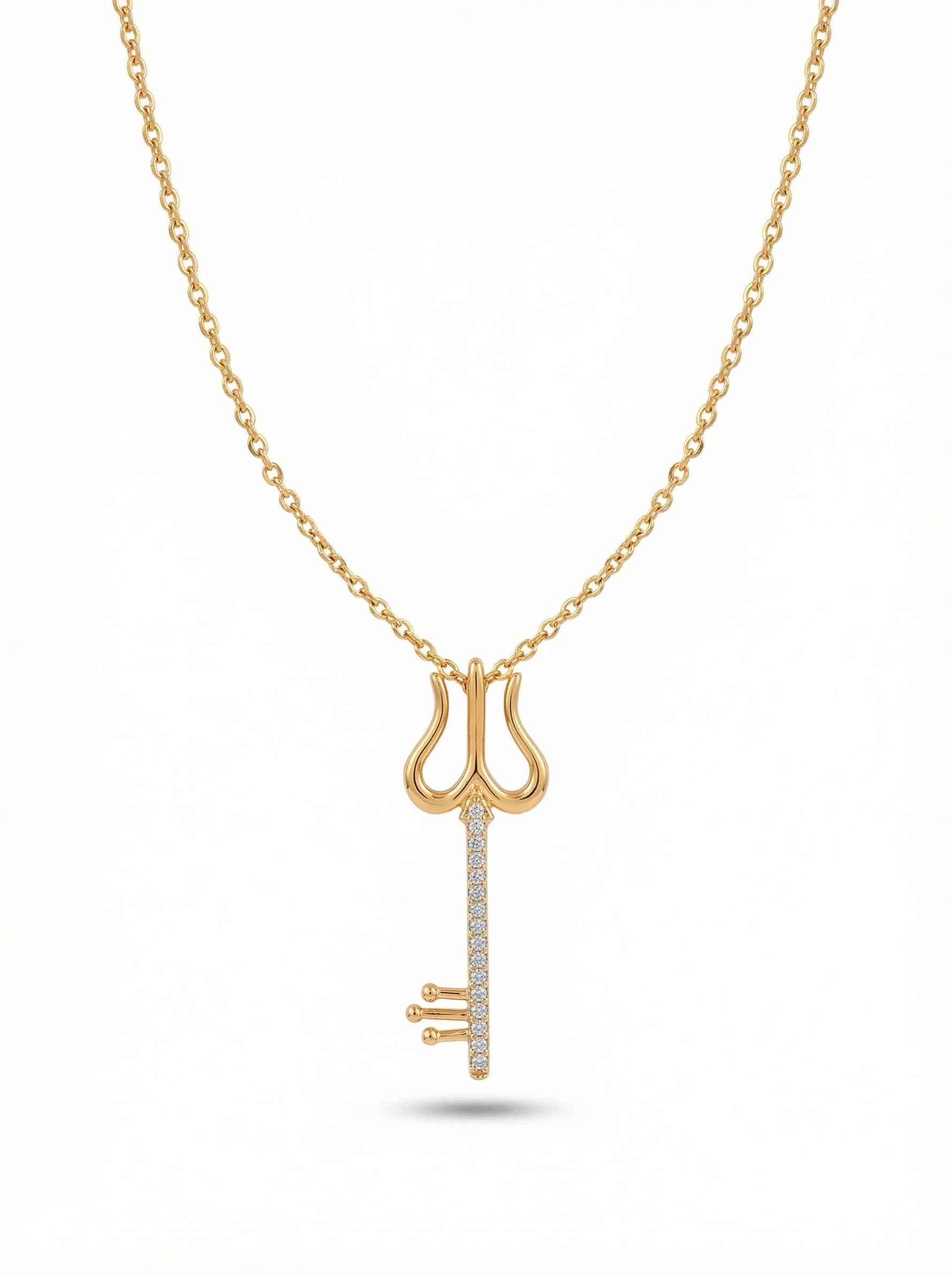 18k Gold plated necklace with a key-shaped pendant on a white background