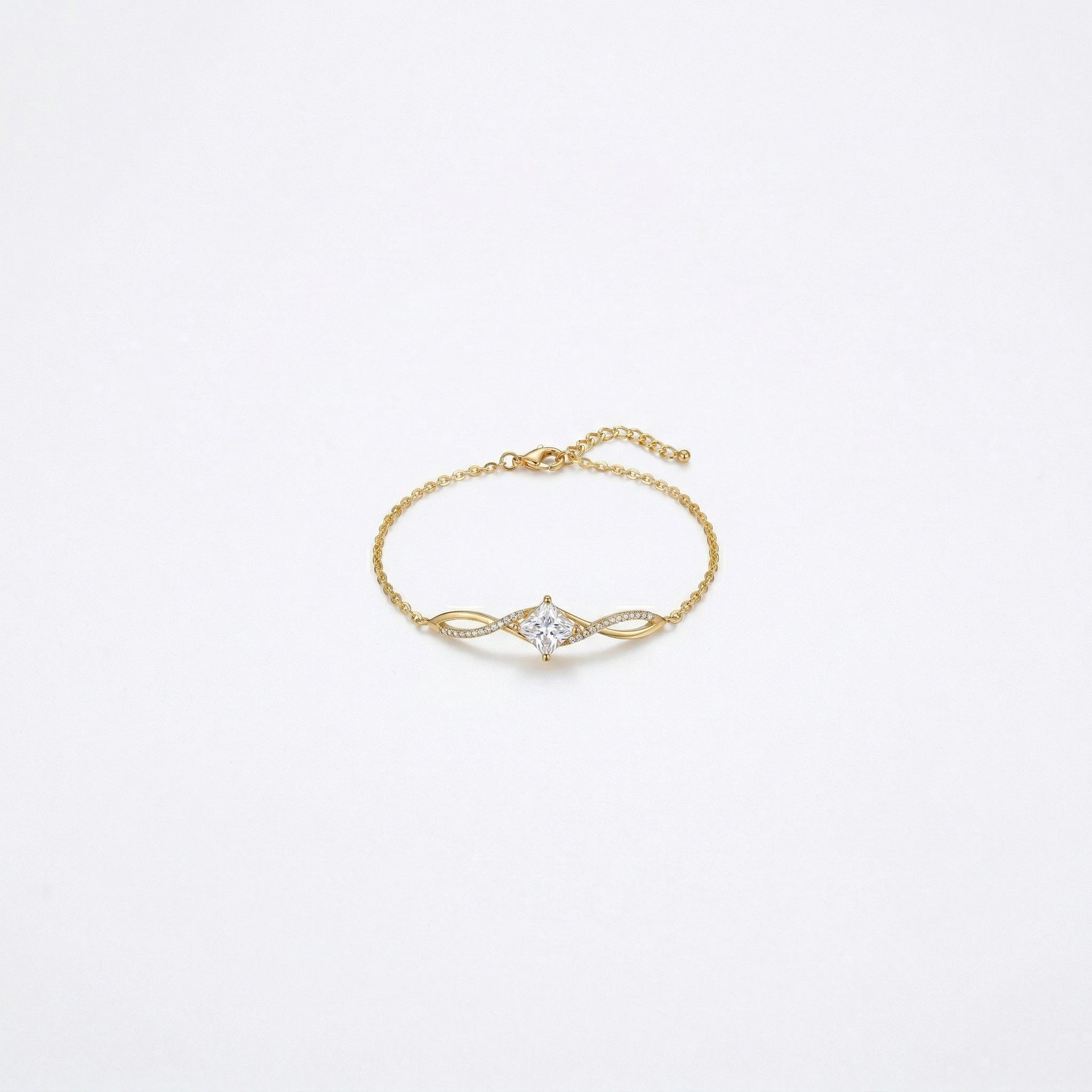 18k Gold plated bracelet with a diamond on a light gray background