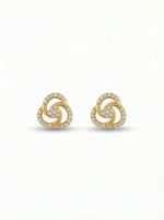 Pair of 18k gold plated earrings with a spiral design on a white background