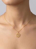 18k Gold plated necklace with a lotus flower pendant on a person's neck against a neutral background