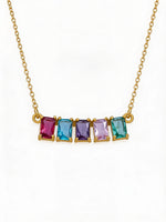Necklace 18k gold plated  with multicolored gemstones on a white background