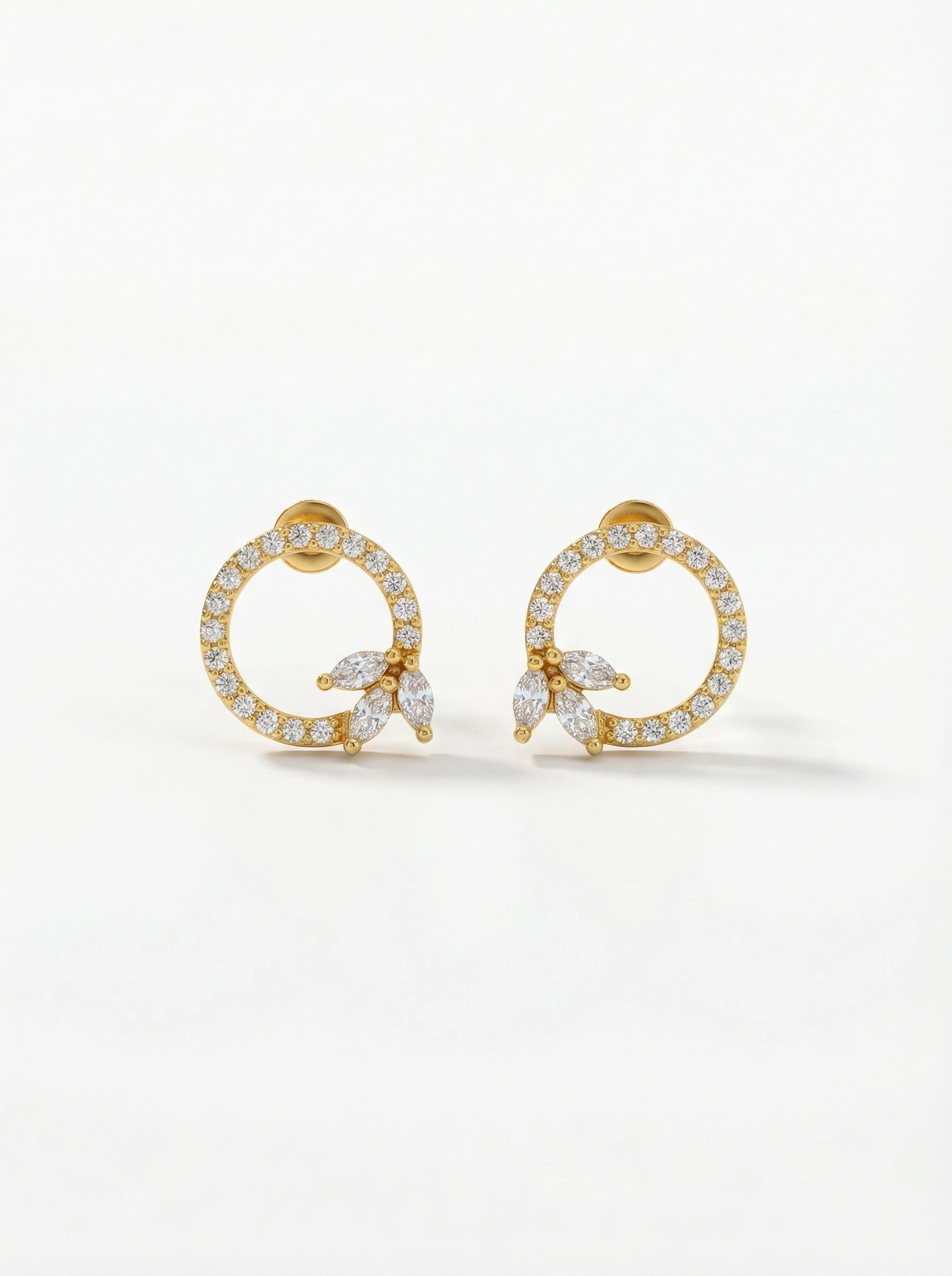 18k Gold plated hoop earrings with clear gemstones on a white background