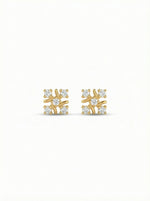 18k Gold plated earrings with diamond accents on a white background