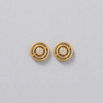 18k Gold plated earrings with circular design on a light gray background