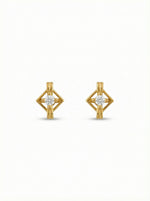 18k Gold plated earrings with diamond-like stones on a white background